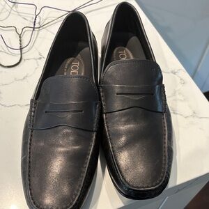 Tod's Black Leather Penny Loafers - Classic Slip-On Style